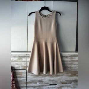 Chic Beige Sleeveless Mini Dress with beaded and jeweled neckline